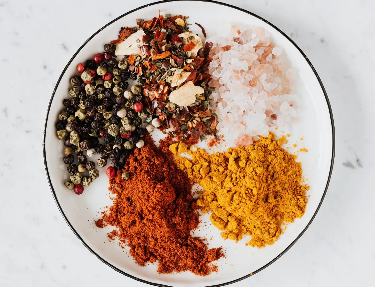 turmeric powders on plate of food